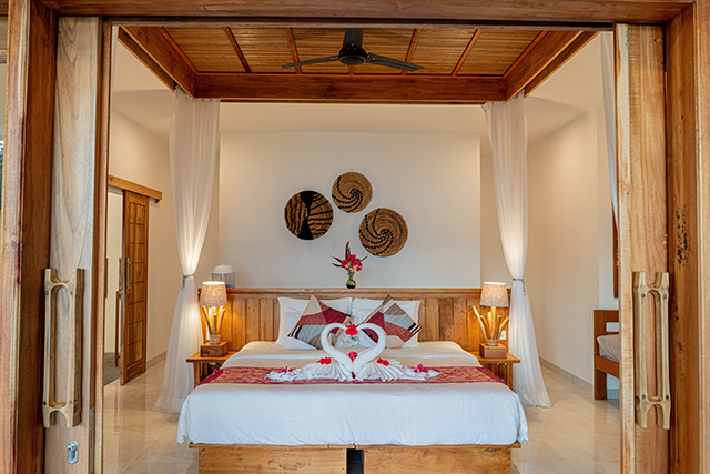Bedroom - Premium Oceanfront Cottage - Murex Bangka Resort - Indonesia Dive Resort