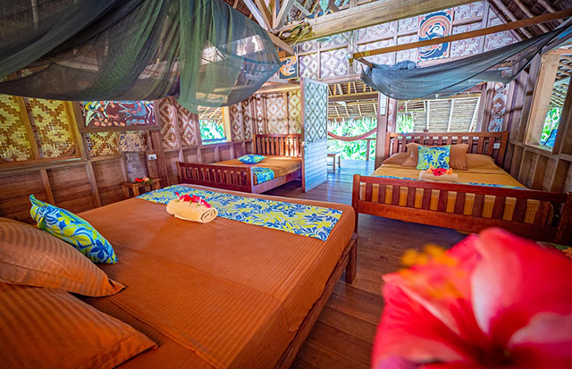 Bedroom - Standard Beachfront - Nusa Island Retreat - PNG Dive Resort